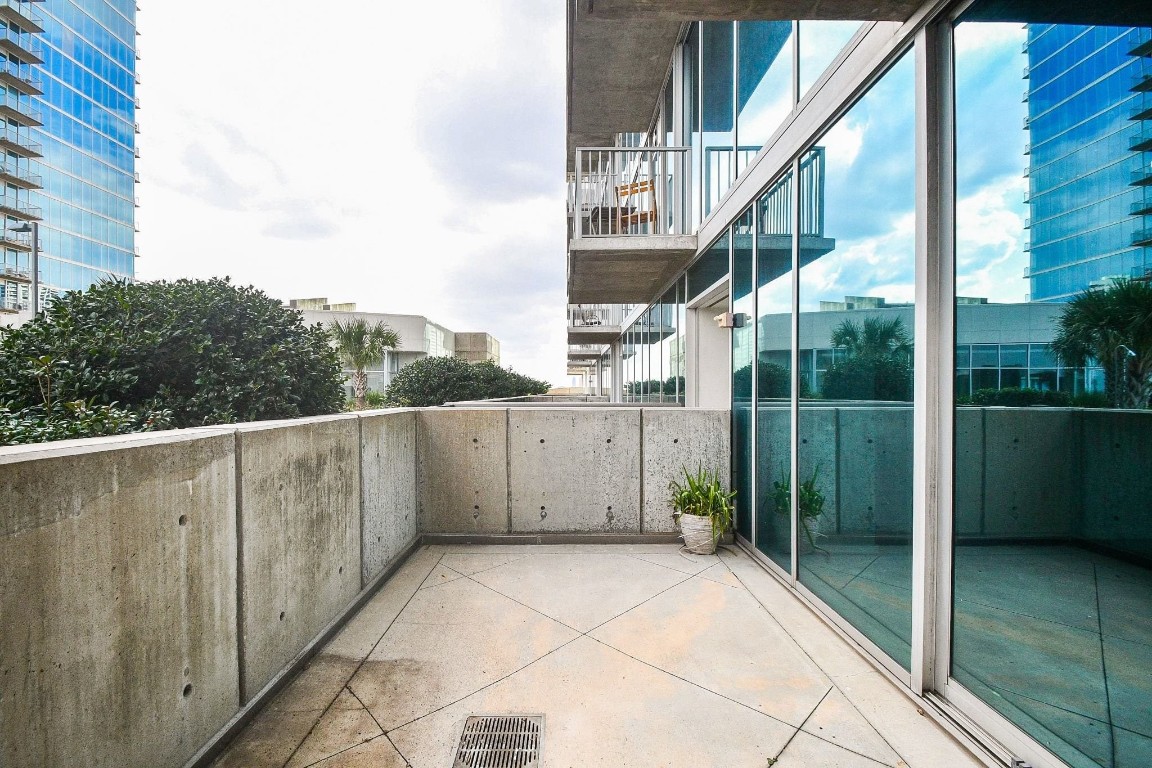 5925 Almeda Road, Unit 10704 Houston, TX 77004 - Photo 19 of 25 Large balcony with views to the pool area, great for entertaining.