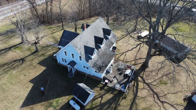 a view of a yard with sitting area
