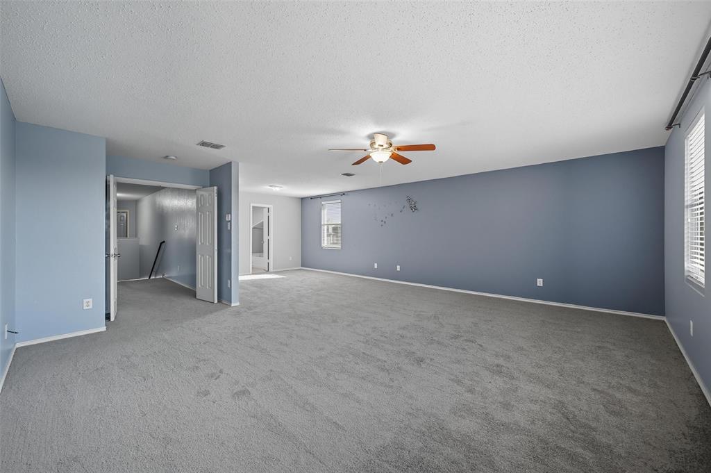 1130 Annie Oakley Drive Anna, TX 75409 - Photo 14 of 32 a view of a livingroom with a sink