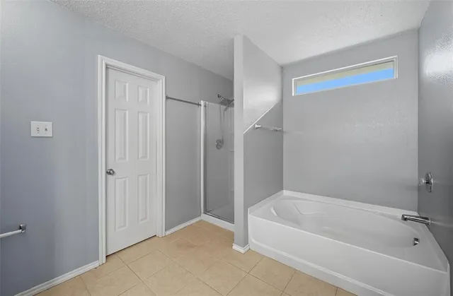a bathroom with a double vanity sink mirror and toilet
