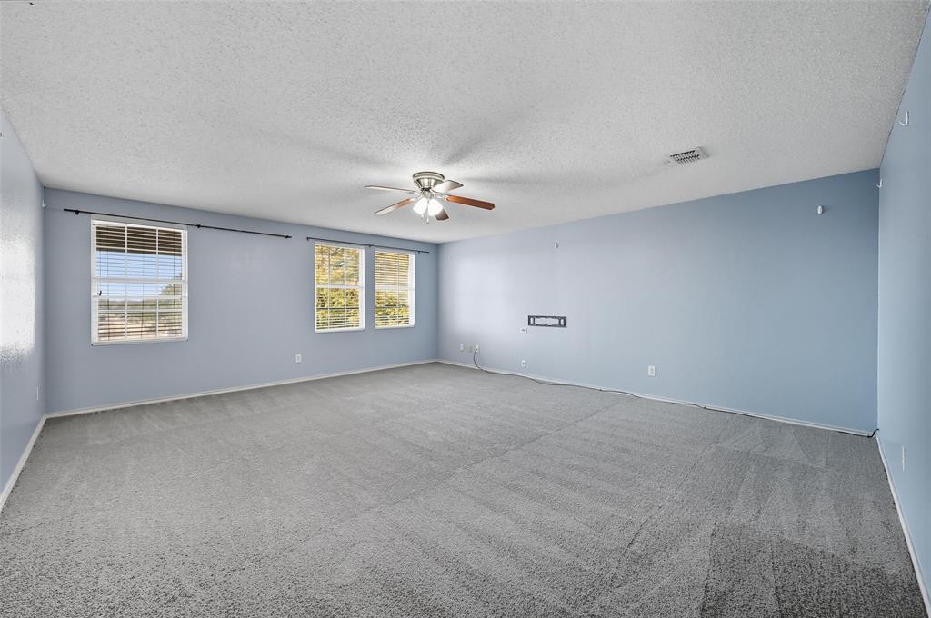 1130 Annie Oakley Drive Anna, TX 75409 - Photo 25 of 32 a view of an empty room with a window