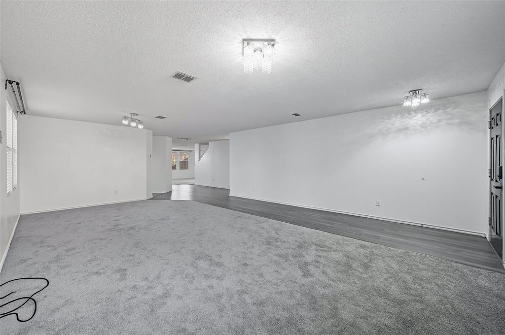 1130 Annie Oakley Drive Anna, TX 75409 - Photo 5 of 32 an empty room with a empty space