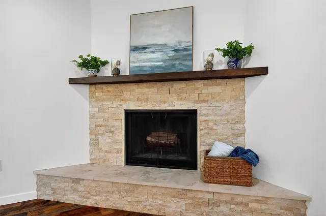 a living room with a fireplace
