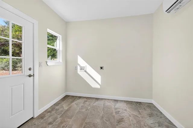 a view of a house with backyard