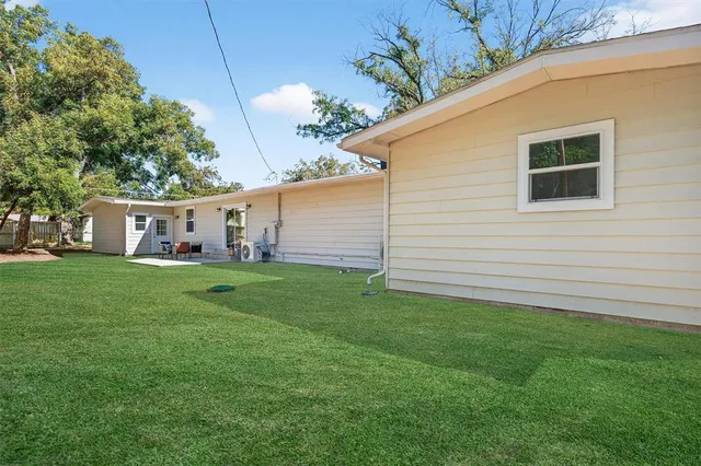 a view of a yard with an outdoor space