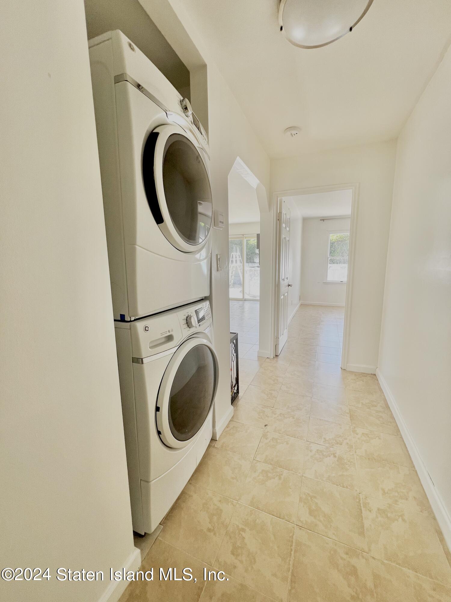 4 Futurity Place Staten Island, NY 10312 - Photo 20 of 26 a utility room with dryer and washer