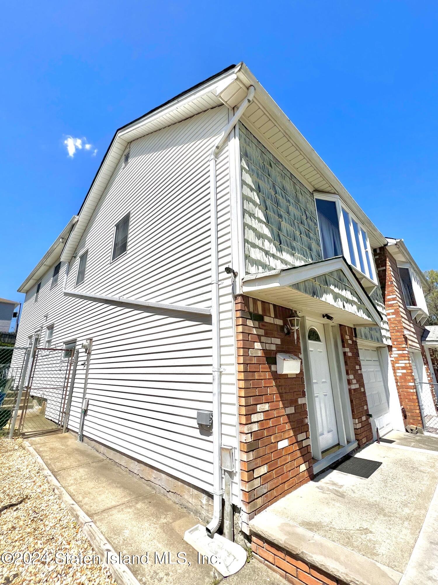 4 Futurity Place Staten Island, NY 10312 - Photo 2 of 26 a front view of a house