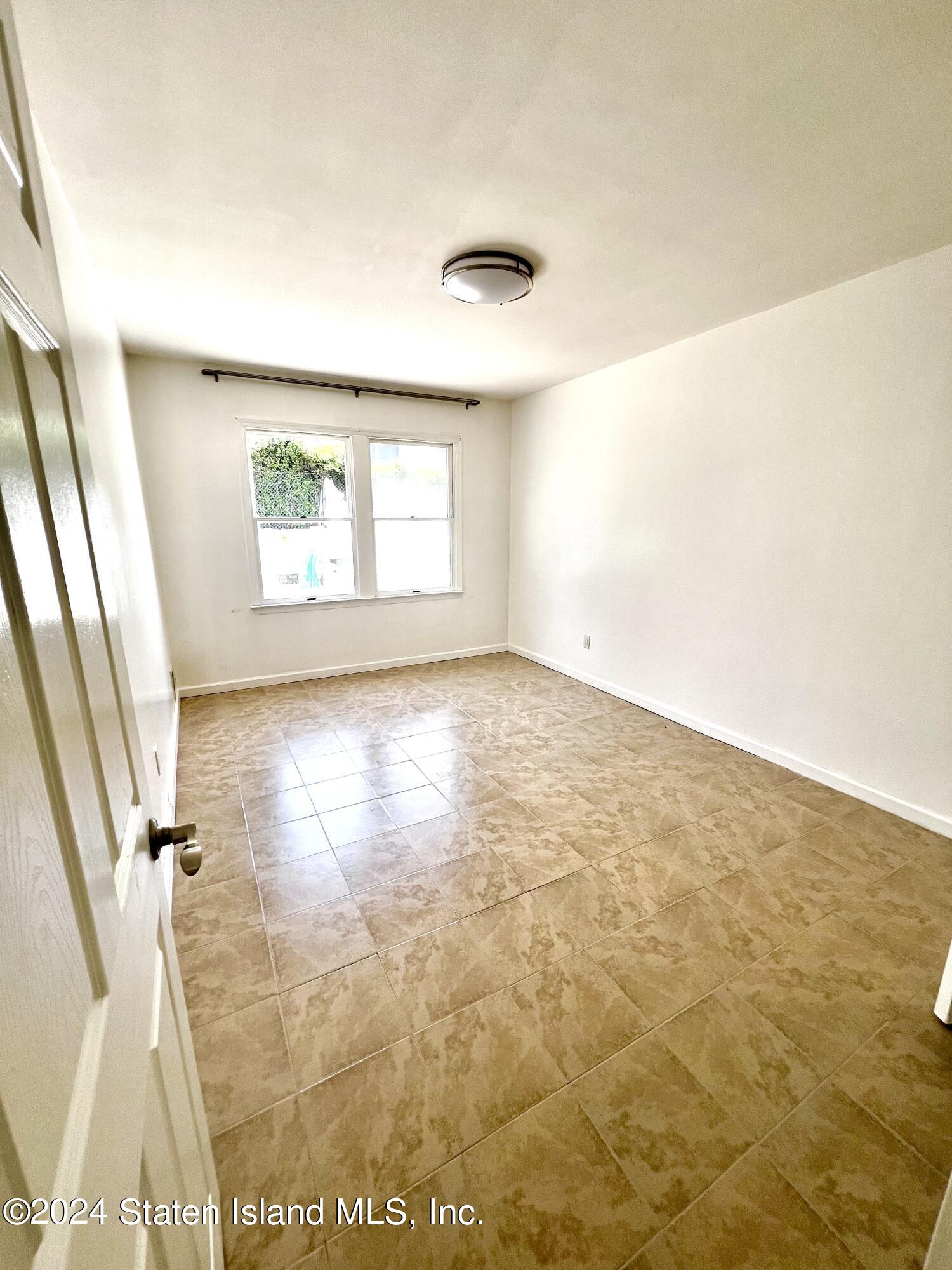 4 Futurity Place Staten Island, NY 10312 - Photo 23 of 26 a view of a room with a window