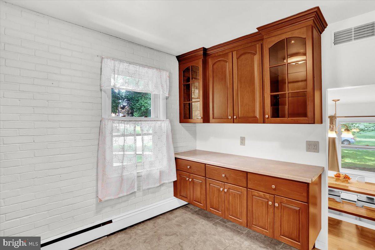 416 Green Lane Reading, PA 19601 - Photo 14 of 42 a bathroom with a sink a mirror and a shower