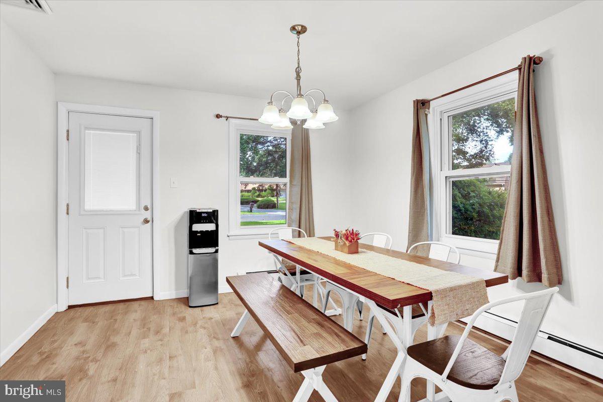 416 Green Lane Reading, PA 19601 - Photo 15 of 42 a living room with furniture a table and a large window
