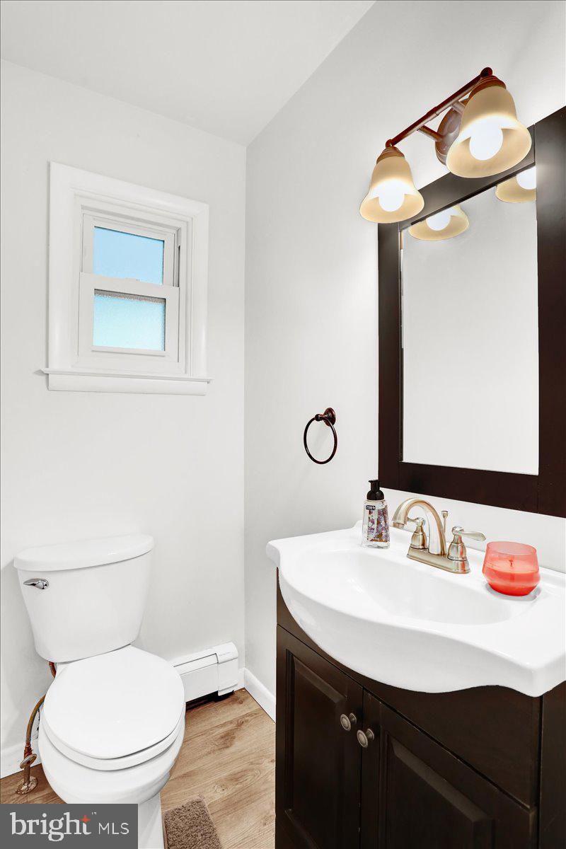 416 Green Lane Reading, PA 19601 - Photo 18 of 42 a bathroom with a toilet sink and mirror