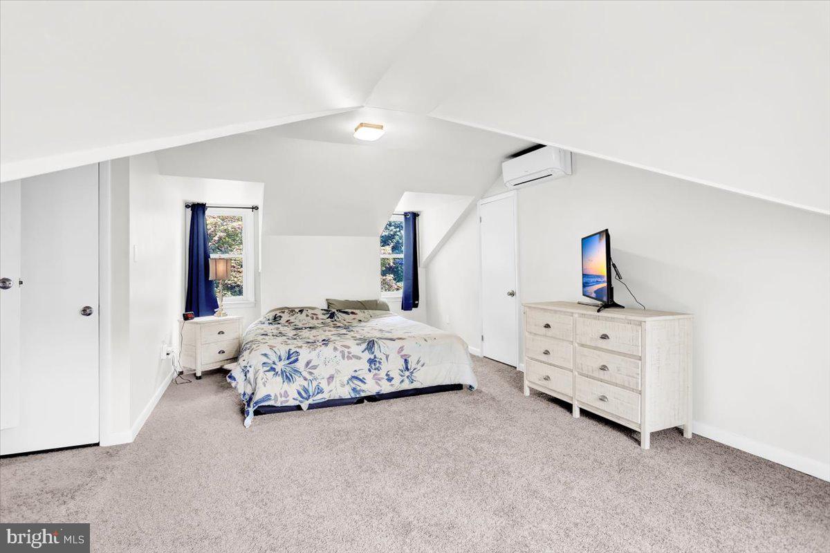 416 Green Lane Reading, PA 19601 - Photo 21 of 42 a bedroom with a bed and a dresser
