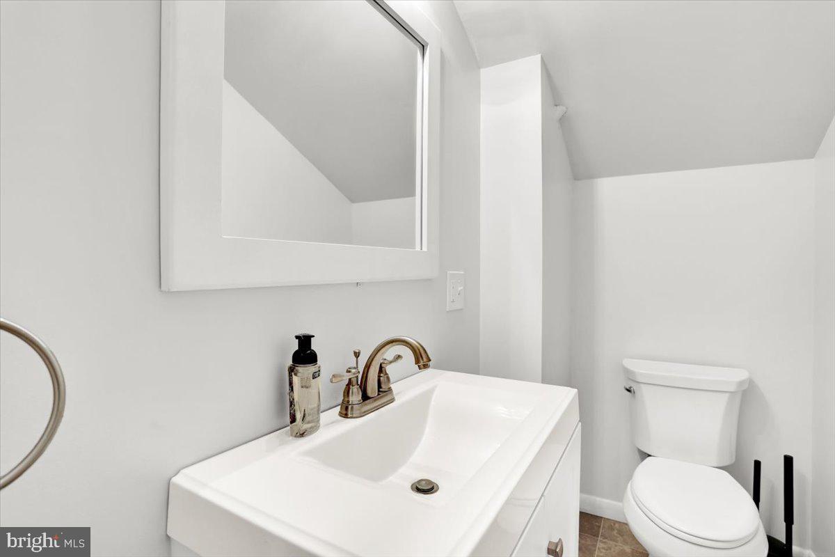 416 Green Lane Reading, PA 19601 - Photo 24 of 42 a bathroom with a toilet sink and mirror
