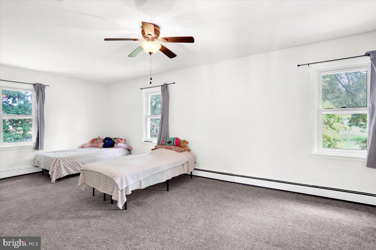 416 Green Lane Reading, PA 19601 - Photo 28 of 42 a room with a bed and a window