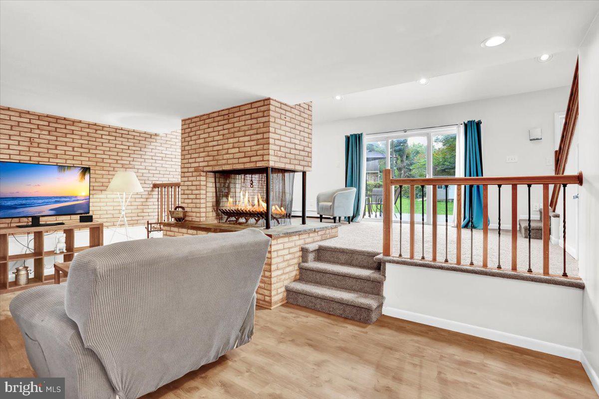 416 Green Lane Reading, PA 19601 - Photo 6 of 42 a living room with furniture and a flat screen tv