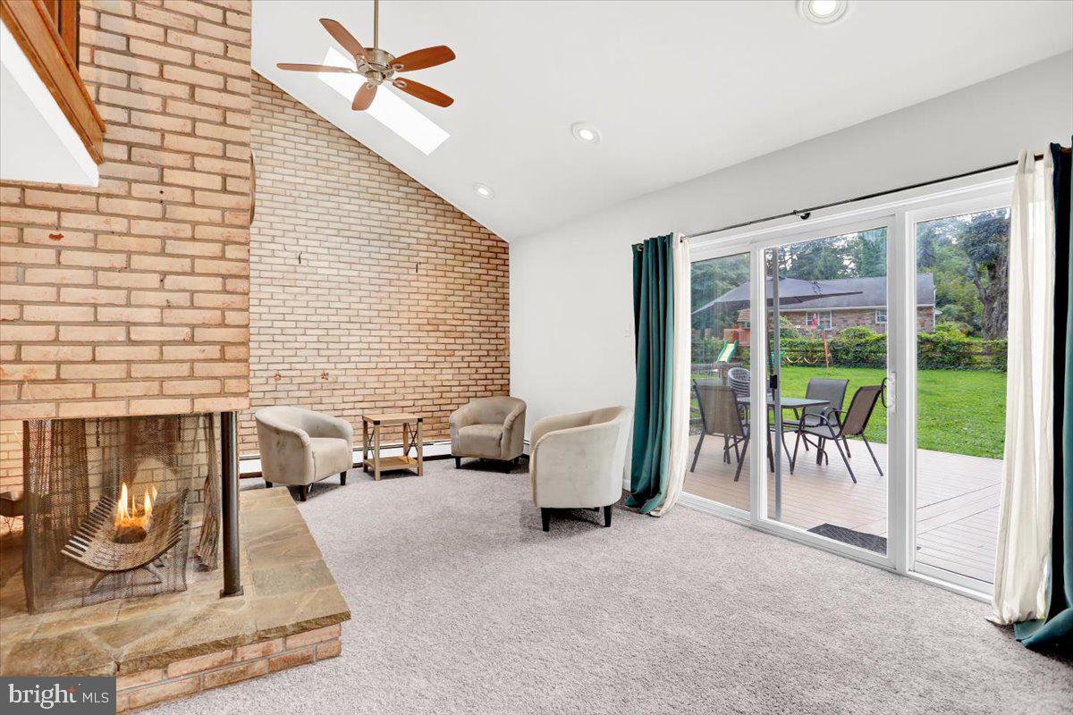 416 Green Lane Reading, PA 19601 - Photo 7 of 42 a living room with furniture and a fireplace