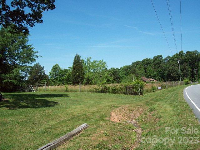 0 Cool Springs Road, Unit NULL Cleveland, NC 27013 - Photo 3 of 5 a backyard of a house with lots of green space
