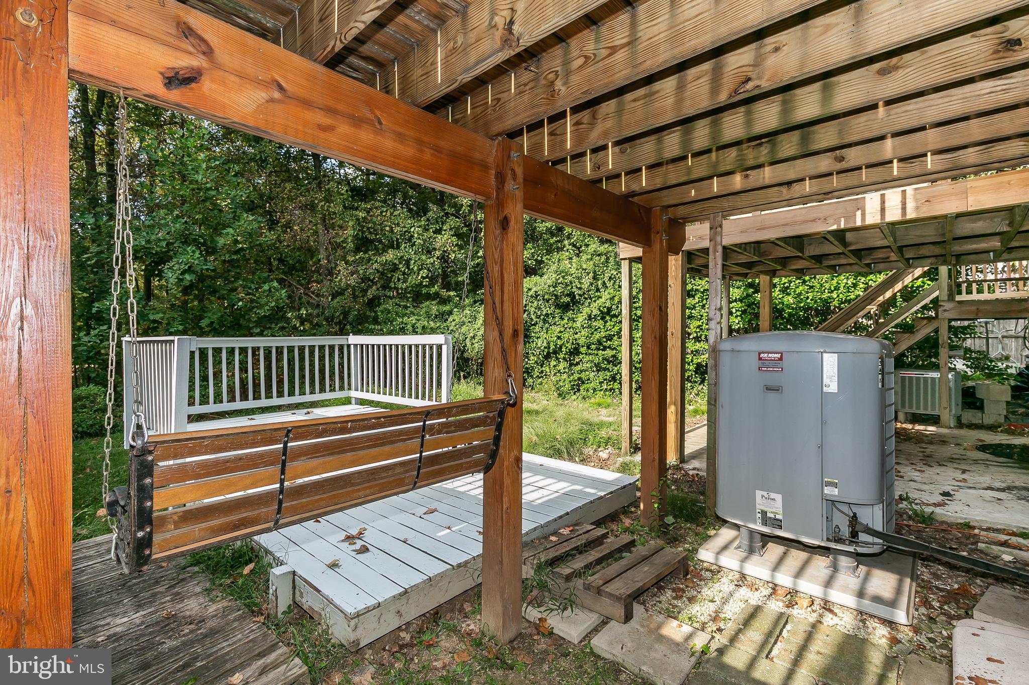 3409 Santee Road Baltimore, MD 21236 - Photo 16 of 28 Under deck area opening to overlook into woods