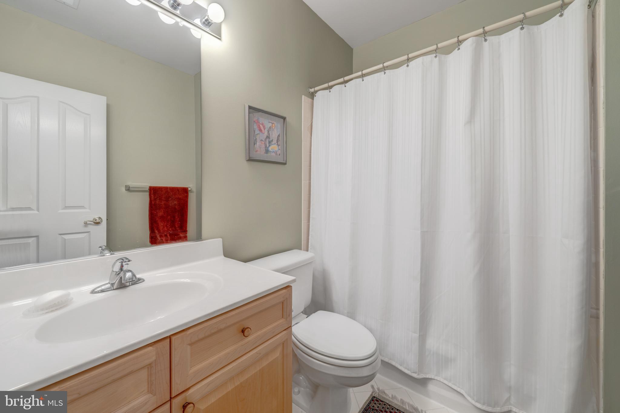 1925 Logan Manor Drive Reston, VA 20190 - Photo 38 of 61 a bathroom with a sink toilet and shower