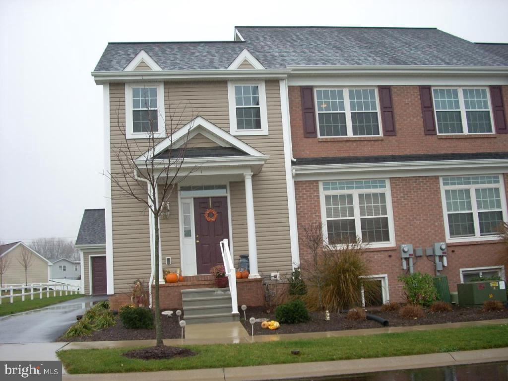 1 Semple Court Lititz, PA 17543 - Photo 1 of 7 a front view of a house with a yard