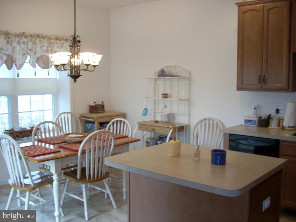 1 Semple Court Lititz, PA 17543 - Photo 2 of 7 a view of a dining room with furniture and chandelier