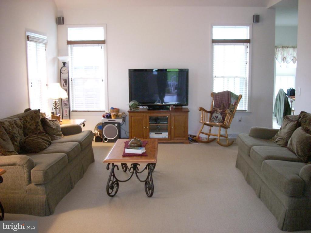 1 Semple Court Lititz, PA 17543 - Photo 3 of 7 a living room with furniture and a flat screen tv