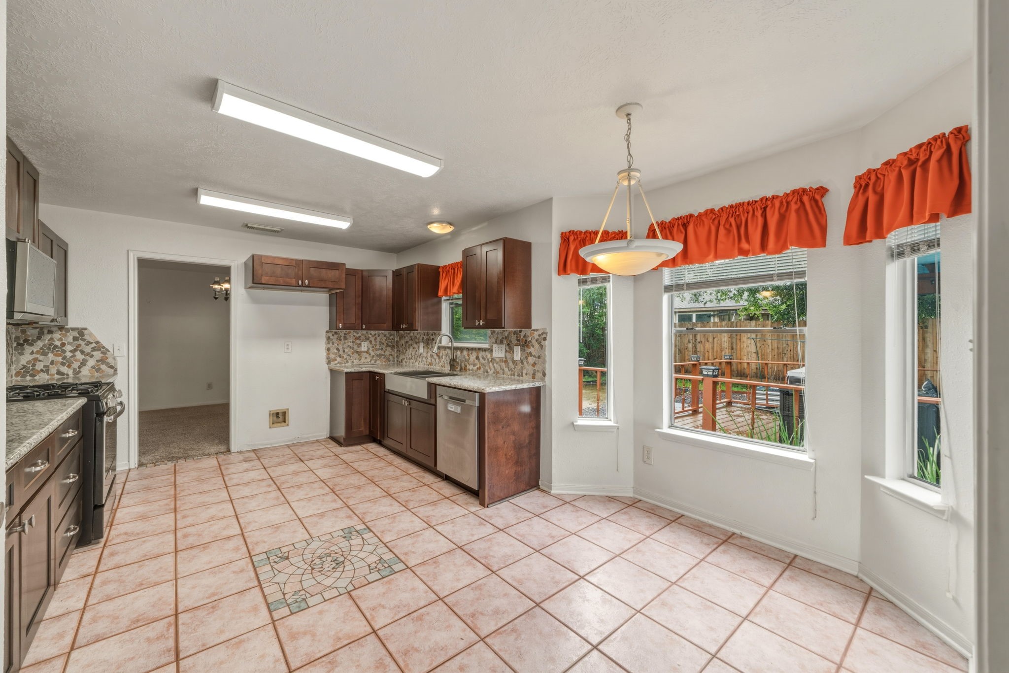 5619 Roserock Lane Spring, TX 77379 - Photo 17 of 45 Kitchen is perfectly spaced for your entertaining needs.