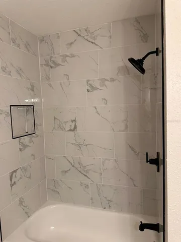 a bathroom with a bathtub