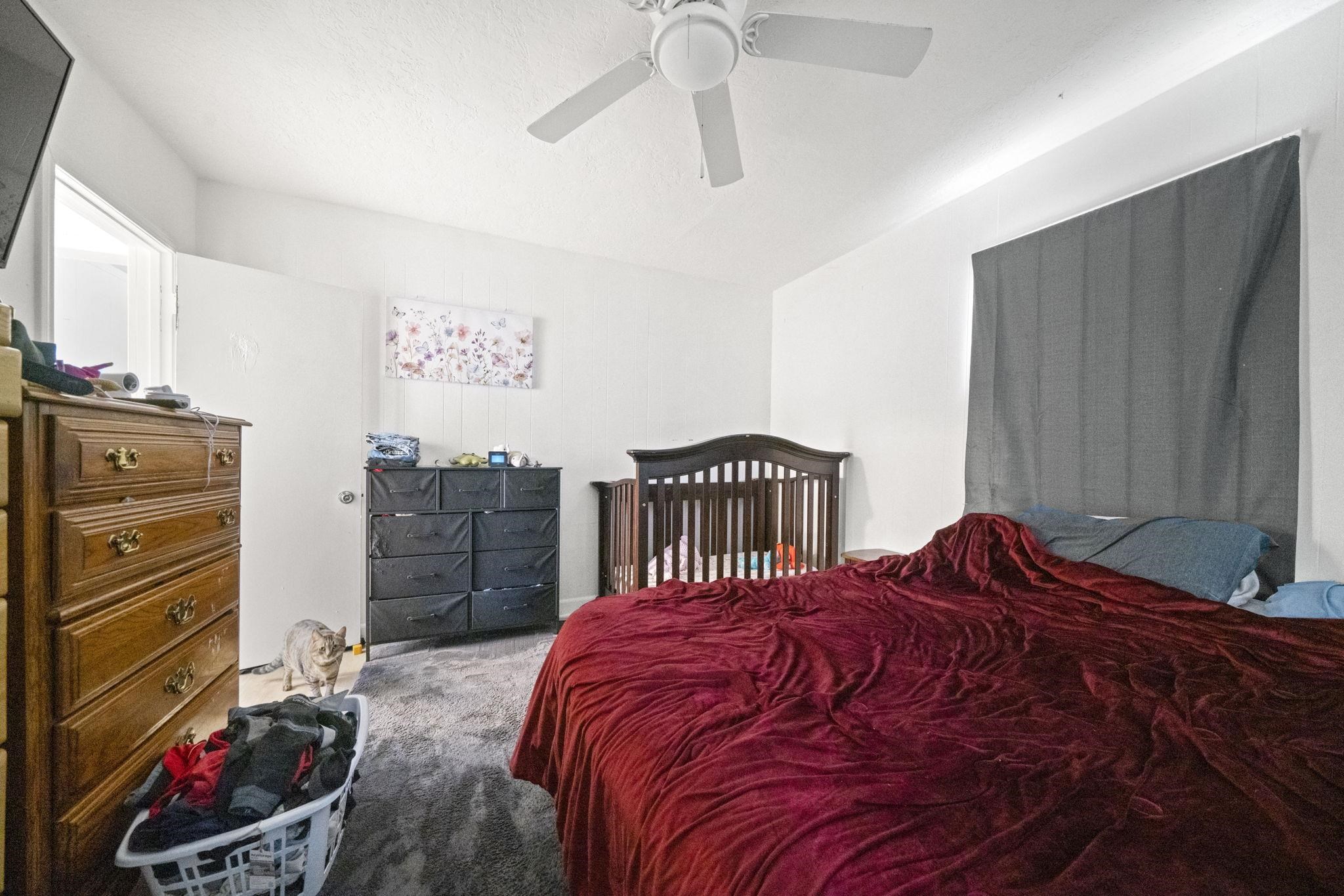 1884 Will James Road Rockford, IL 61109 - Photo 23 of 26 a bedroom with a bed and a closet