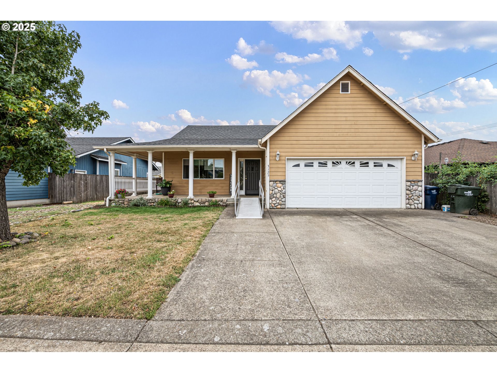 3125 V Street Springfield, OR 97477 - Photo 1 of 19 a view of house with yard and entertaining space