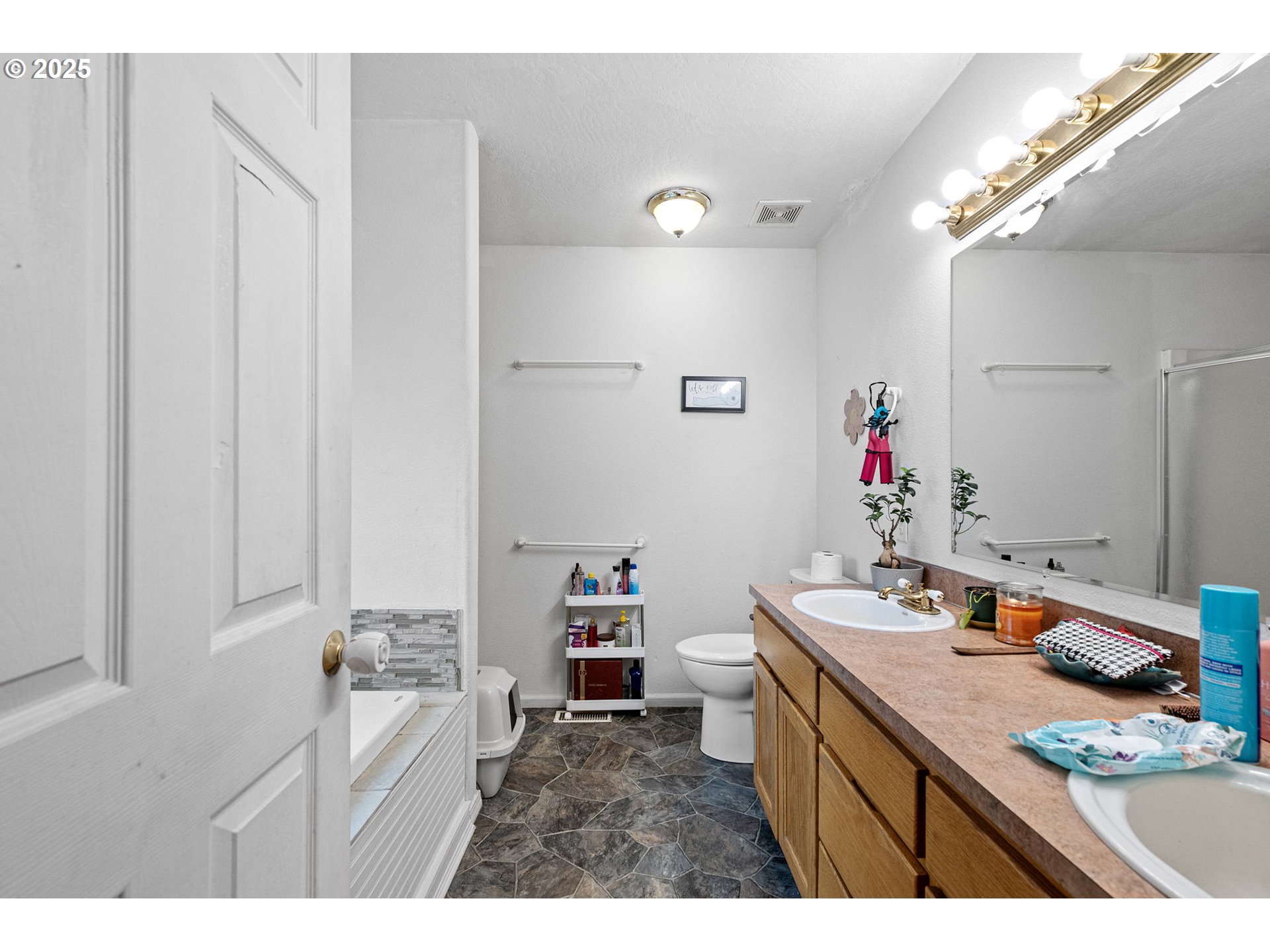 3125 V Street Springfield, OR 97477 - Photo 11 of 19 a kitchen with a sink cabinets and appliances