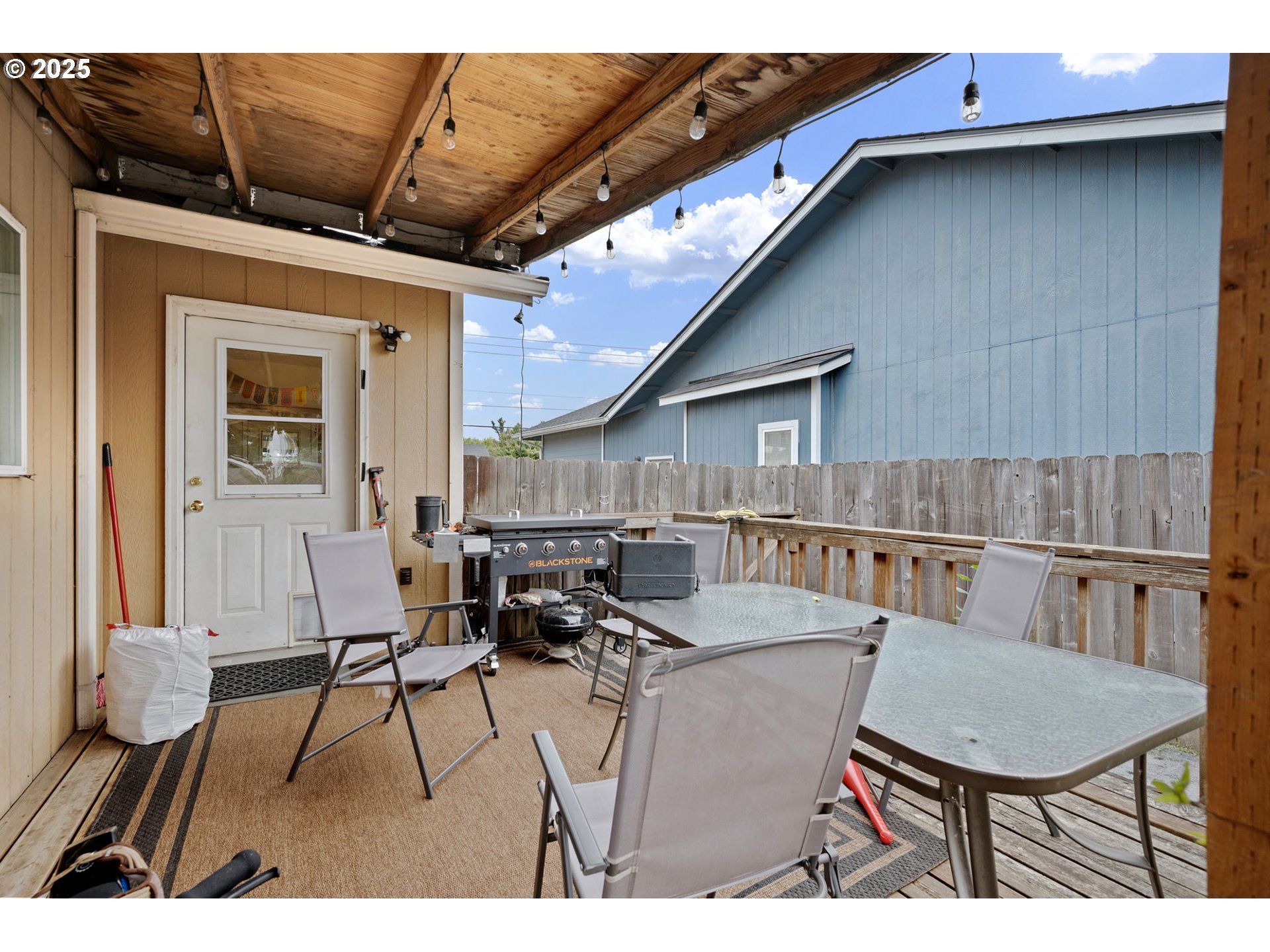 3125 V Street Springfield, OR 97477 - Photo 14 of 19 a balcony with table and chairs