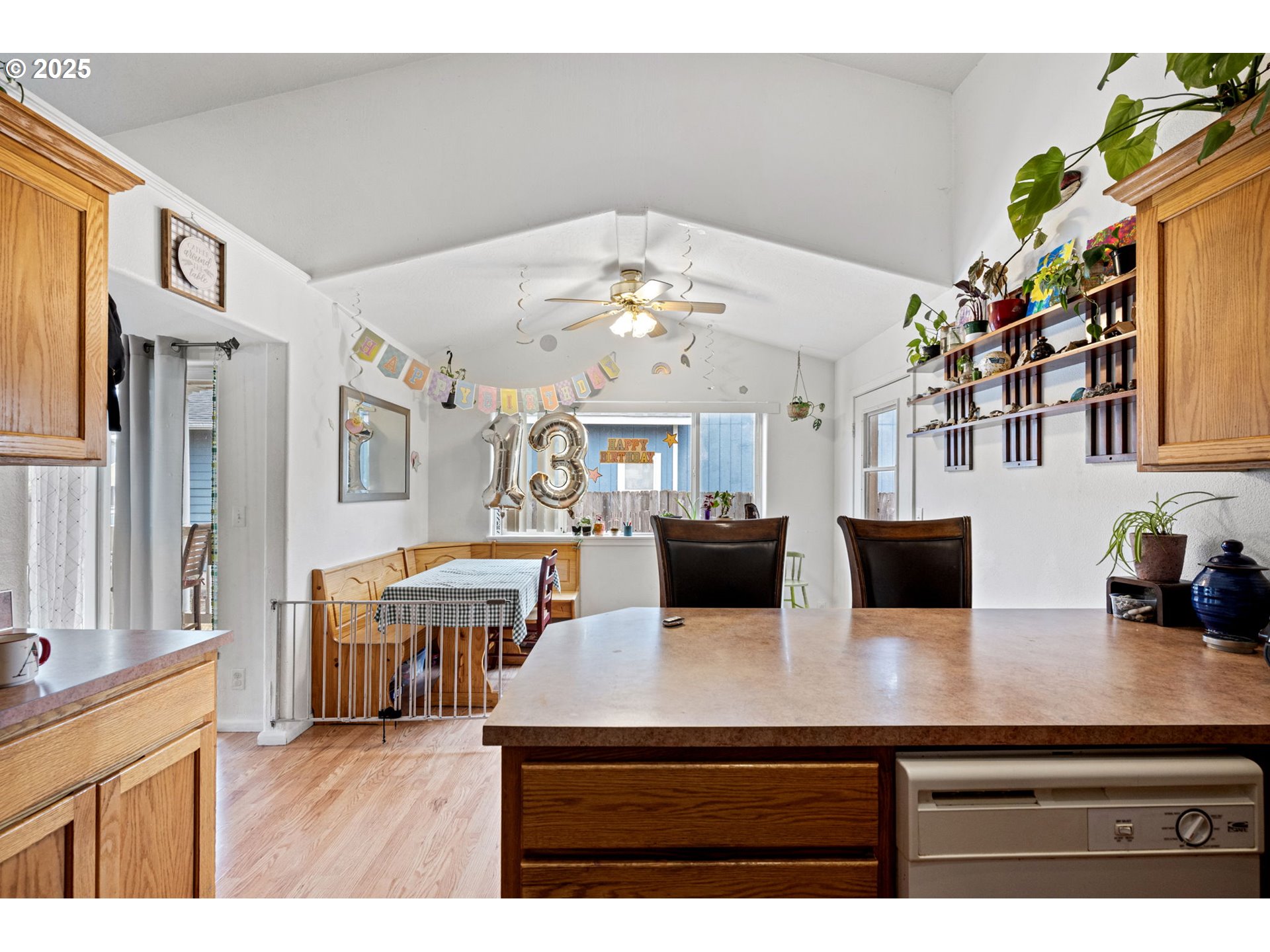 3125 V Street Springfield, OR 97477 - Photo 4 of 19 a living room with furniture and a chandelier