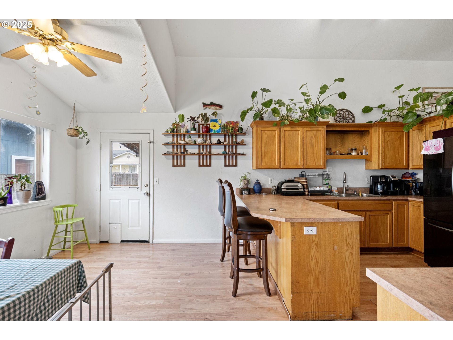 3125 V Street Springfield, OR 97477 - Photo 6 of 19 a open kitchen with stainless steel appliances granite countertop a stove and a refrigerator