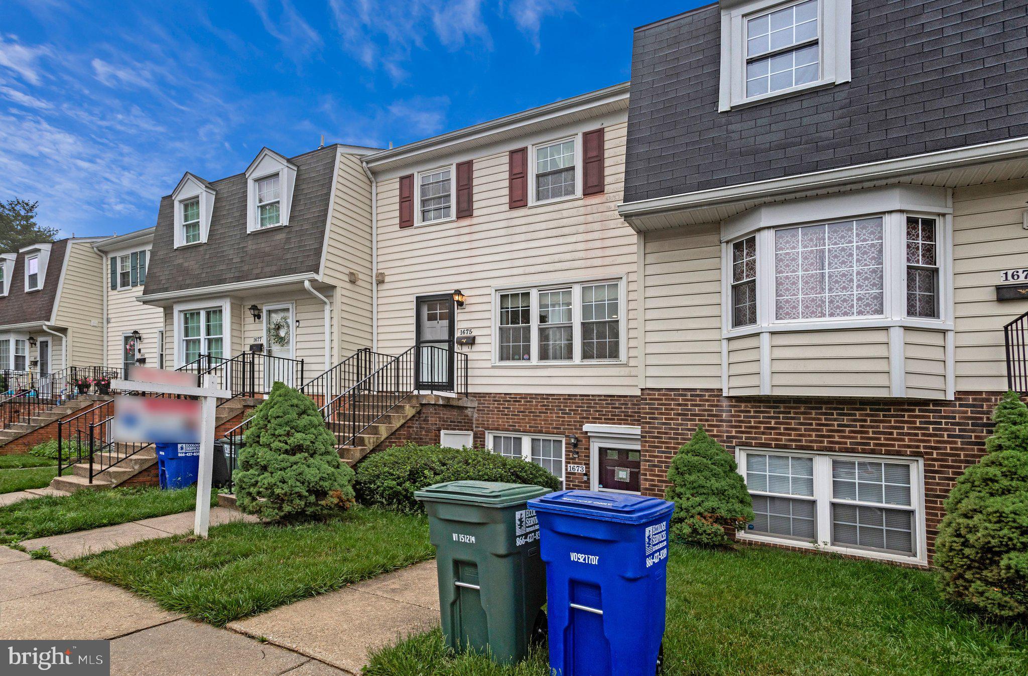 1675 Ridgely Court, Unit 182 Crofton, MD 21114 - Photo 15 of 47 a front view of a house with garden