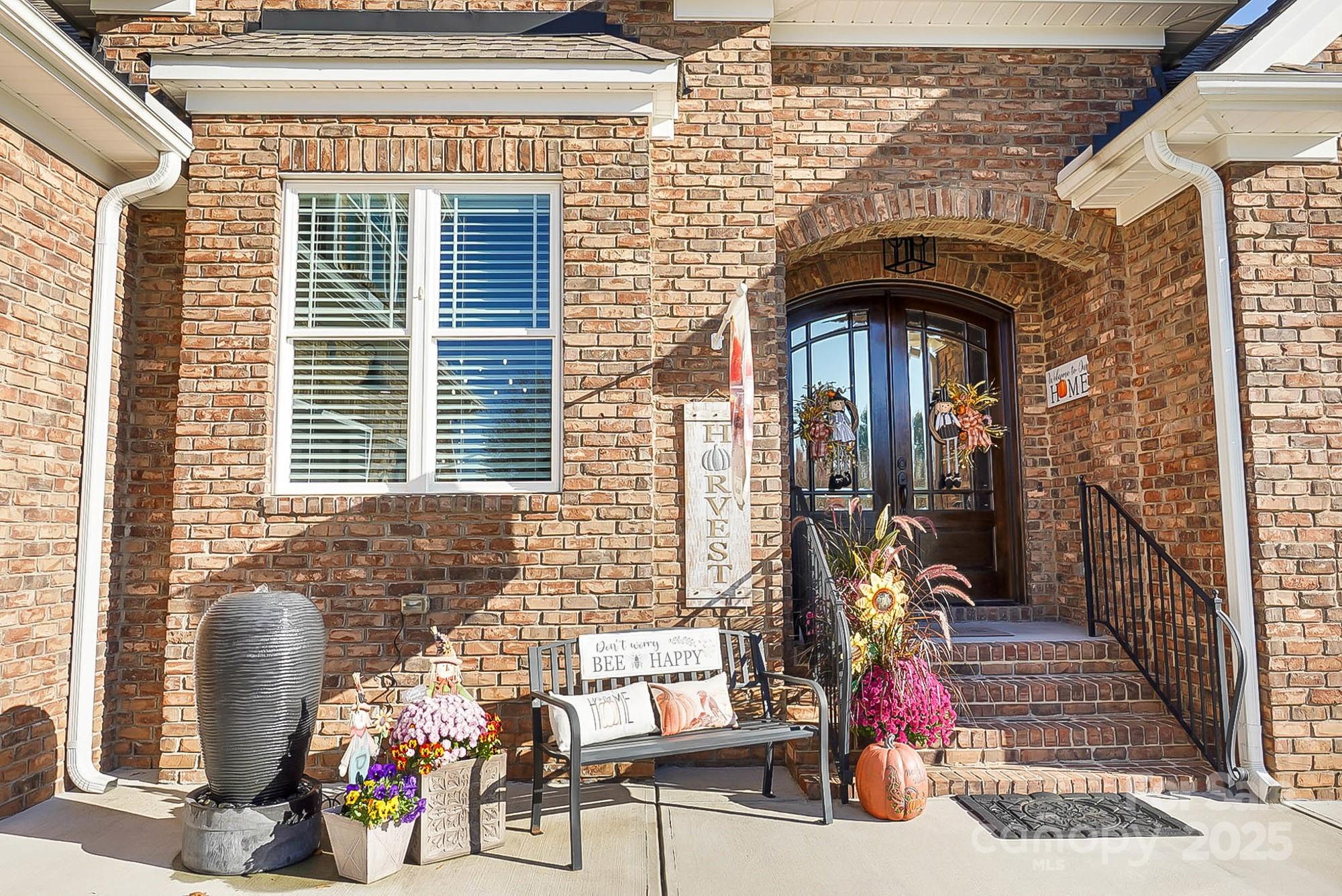 2102 Virginia Ellen Court Stanley, NC 28164 - Photo 7 of 48 a front view of a house with outdoor seating