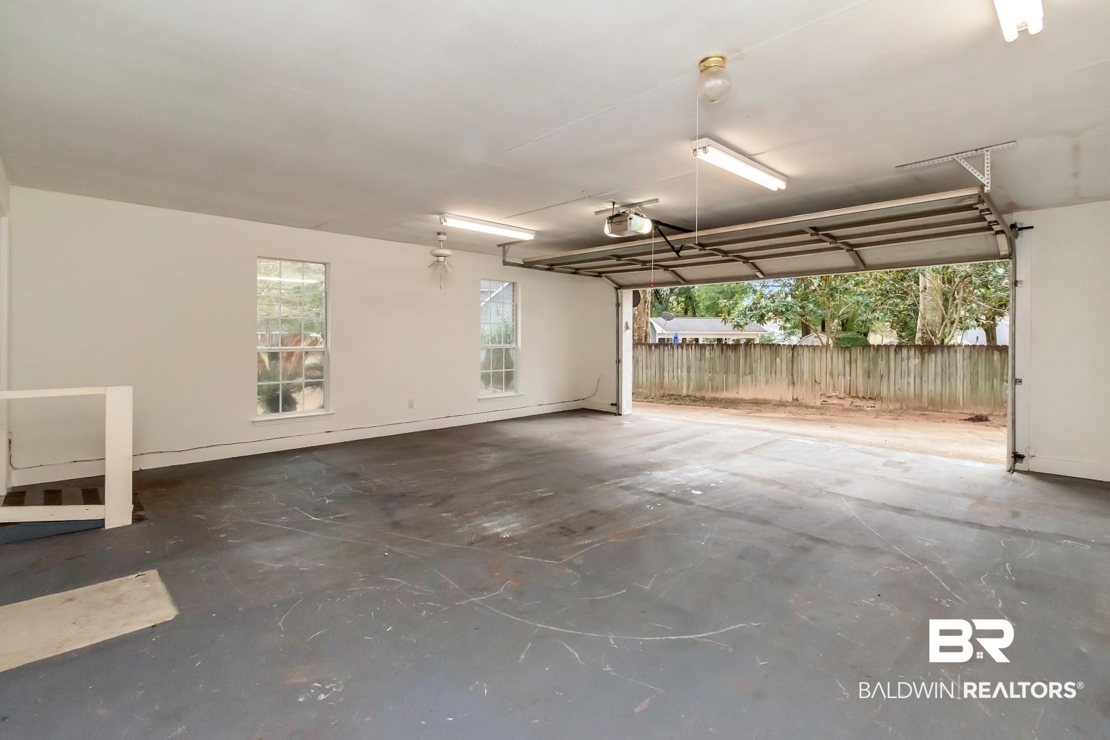 10006 Wedgefield Court Mobile, AL 36608 - Photo 28 of 34 Garage with a garage door opener