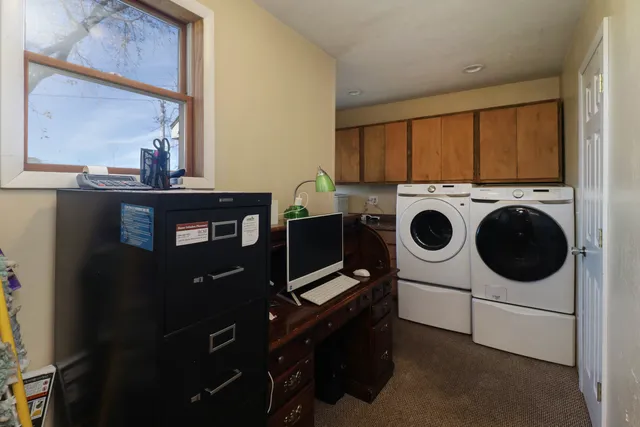 a utility room with dryer and washer