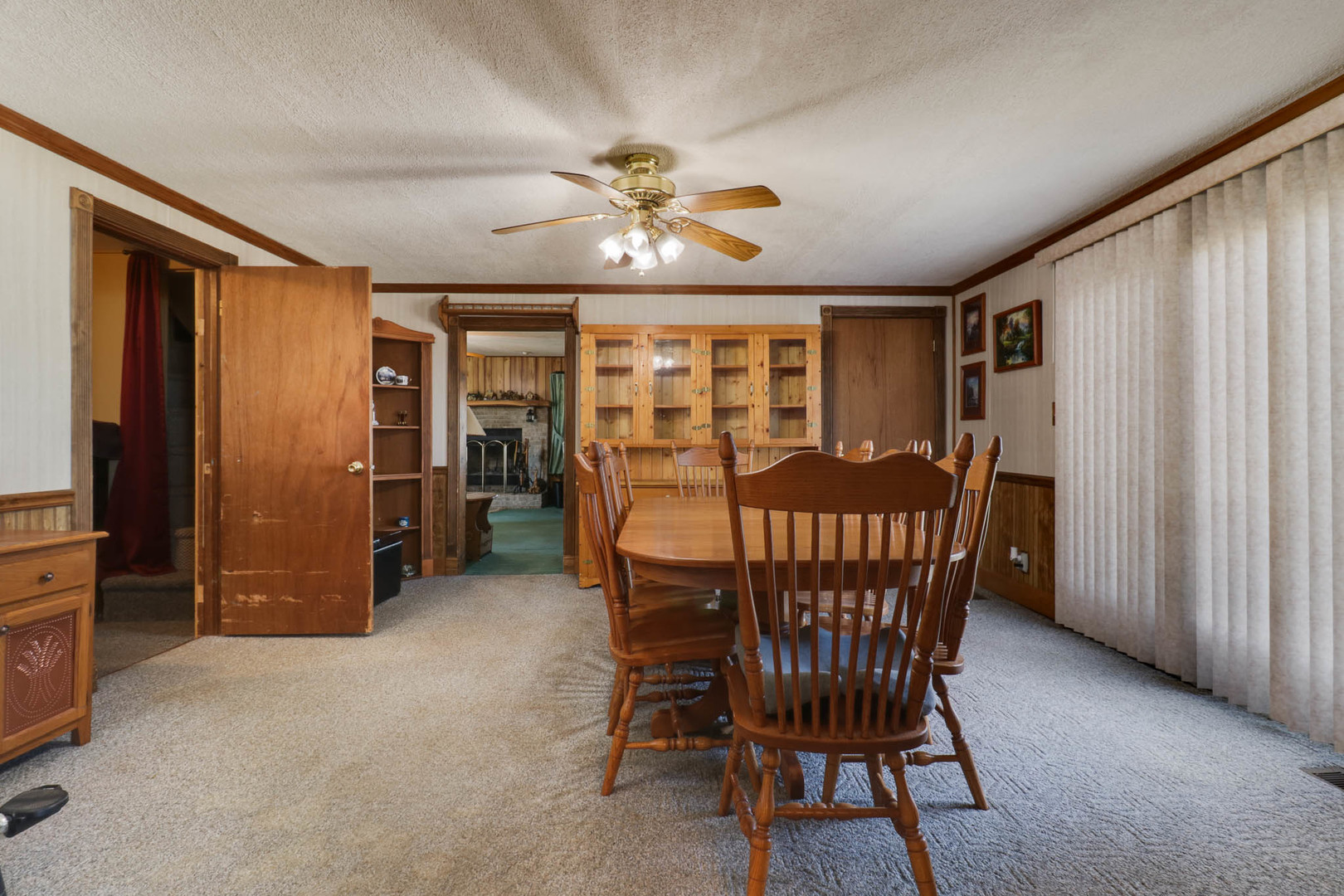 32892 McClure Road Colfax, IL 61728 - Photo 16 of 44 a view of a dining room with furniture window and chandelier