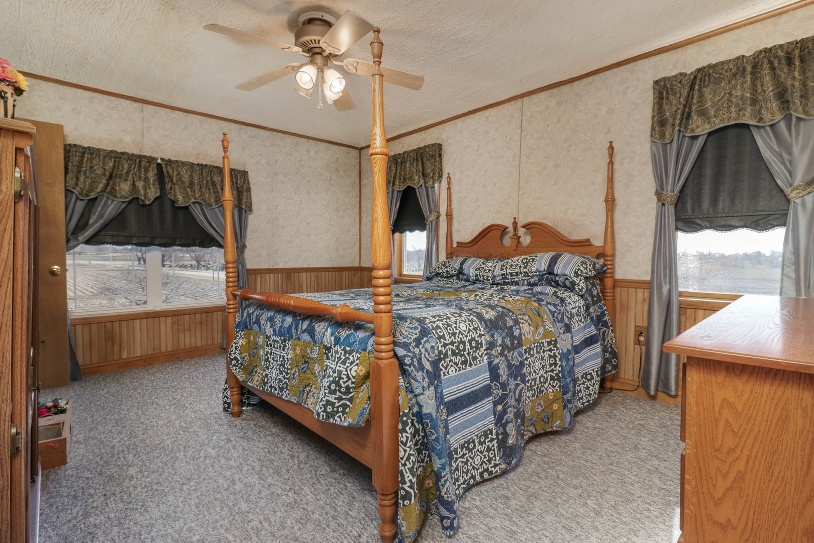 32892 McClure Road Colfax, IL 61728 - Photo 28 of 44 a bedroom with a bed and a mirror