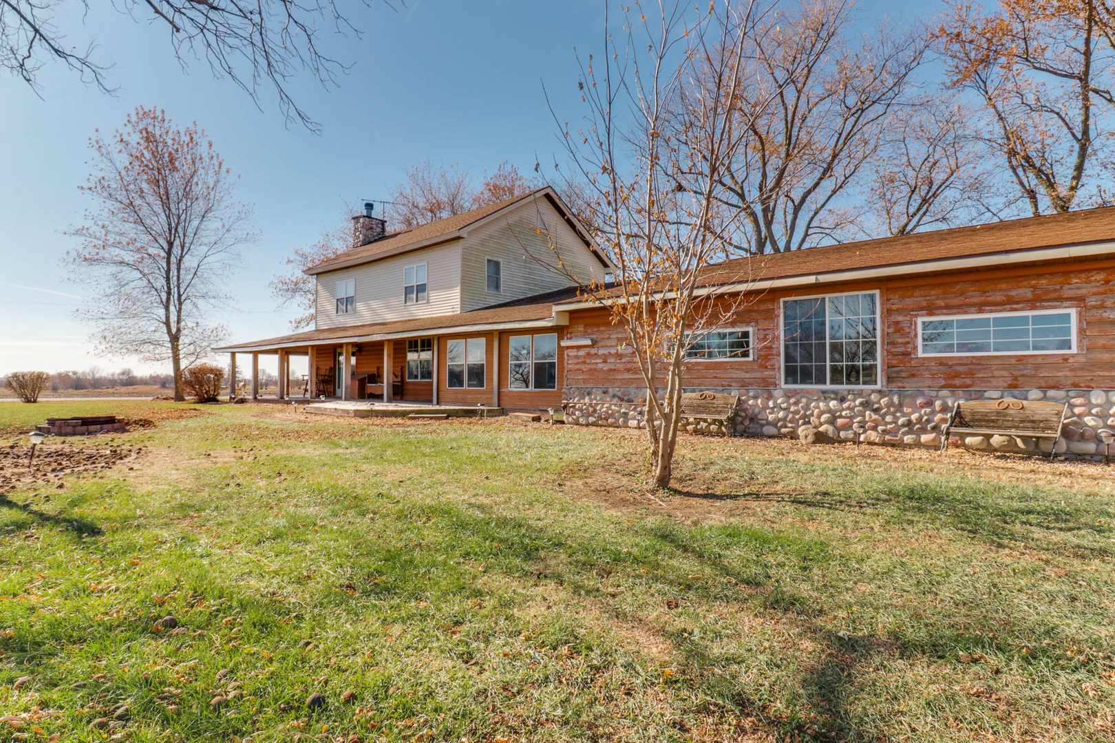 32892 McClure Road Colfax, IL 61728 - Photo 3 of 44 a view of a house with a yard and sitting area