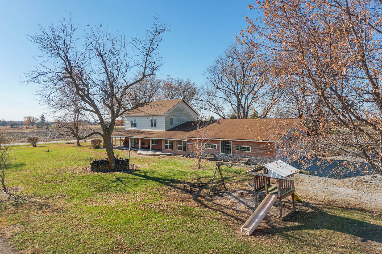 32892 McClure Road Colfax, IL 61728 - Photo 44 of 44 a view of a house with pool and sitting area