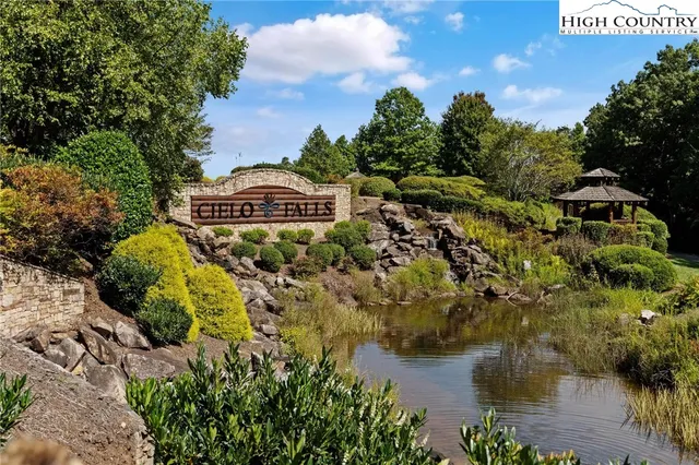 a view of a lake with building
