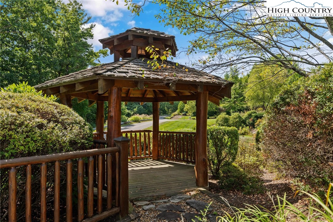 Lot 2 East Cielo Ridge Way Purlear, NC 28665 - Photo 21 of 24 a view of a yard with wooden fence