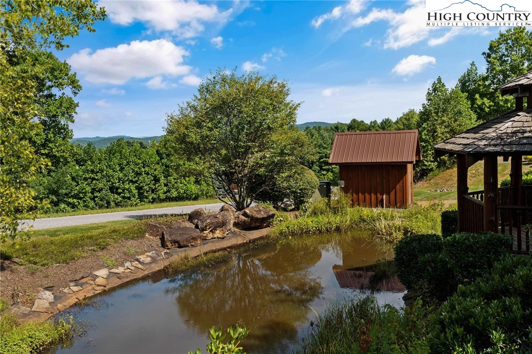 Lot 2 East Cielo Ridge Way Purlear, NC 28665 - Photo 24 of 24 a view of a house with a yard