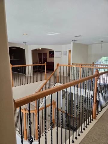 a view of entryway with wooden floor