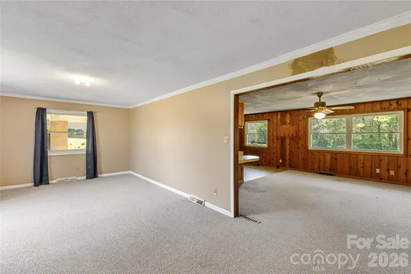 a view of a livingroom with a staircase