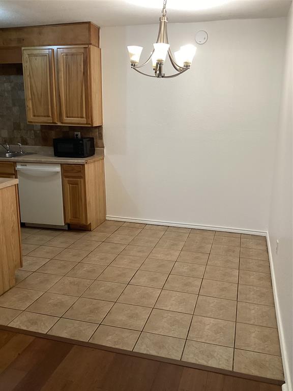 214 Locust Street South Sulphur Springs, TX 75482 - Photo 13 of 13 a view of kitchen with granite countertop cabinets