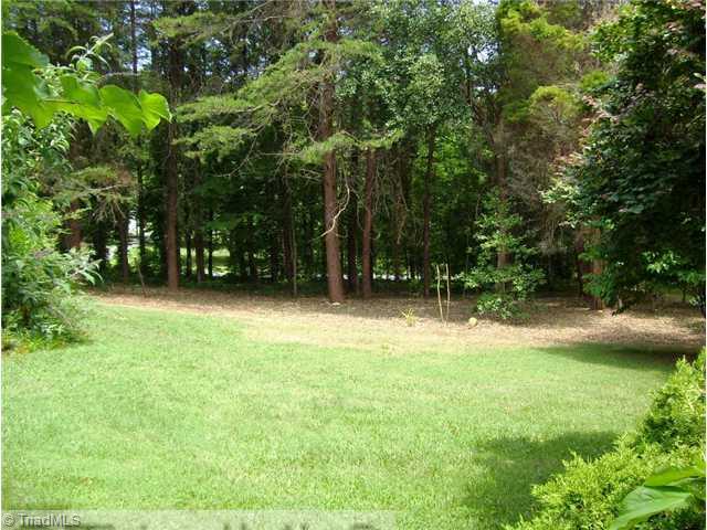 5615 Horse Farm Road Summerfield, NC 27358 - Photo 1 of 15 Land/Lot. View from covered, front porch. Additional plants inlcude hostas, an herb garden, tiger lillys, blue spruce, primrose, mini lilacs, black-eyed susan, hollys and more!