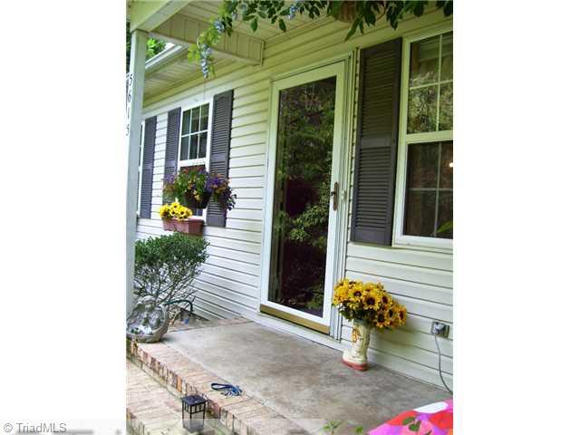 5615 Horse Farm Road Summerfield, NC 27358 - Photo 3 of 15 Remarks. The covered front porch welcomes you!